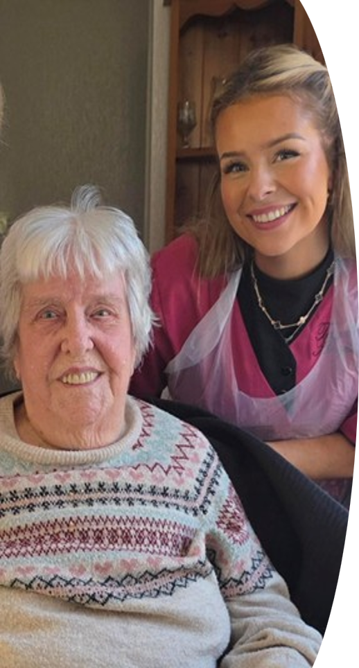 A person being supported by a carer in a Teign Angels uniform